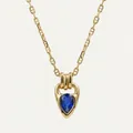 Detail of a teardrop-shaped blue zircon pendant on an 18K gold-plated necklace chain - Sapphire Blue