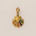 Detailed close-up of a gold seashell charm featuring vibrant multi-colored rhinestones - Colorful Rhinestone Shell Pendant / Gold
