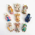 Detailed view of nine cute cartoon cat pendants with school-themed designs - Pencil Cat Pendant Only (Without Chain)