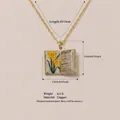 Vintage March birth flower book necklace in copper with yellow daffodil detail - March Daffodil Book Necklace
