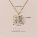 Vintage book-shaped pendant necklace with daisy and 'April' inscription in gold finish - April Daisy Book Necklace