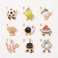 Macro view of nine sports-themed enamel pendants including soccer and tennis designs - Pendant Only / Soccer Pendant-1