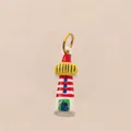 Vista dettagliata di un ciondolo a forma di faro dai colori vivaci e accesi - Pendente Faro