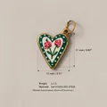 Detail view of heart rose pendant with 316 stainless steel material dimensions - Double-Headed Rose Heart (No. 3) / 17x13mm / Gold