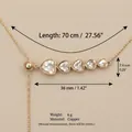 Detailed view of gold heart crystal necklace with 70cm length and copper material specs - Luxury 5-Heart Zirconia Necklace / Gold