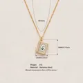 Macro view of vintage gold-tone book pendant necklace in stainless steel with dimensions - Hand-painted Book Necklace (HSNK253806K) / Coffee Flower Style