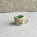 Miniature beige ceramic cup charm pendant with green vine print for creative DIY jewelry making - Branch Cup Pendant