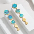Macro detail view of elegant gold geometric circular earrings with blue shell inlays. - Iridescent Shell Slice Style (YCE1151-lv) / Colorful