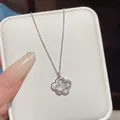 Close-up of elegant double-layer mother-of-pearl flower necklace pendant with crystals - X447 Silver Titanium Steel Color Retention