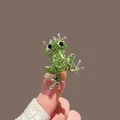 Magnifique broche grenouille en strass verts avec cristaux scintillants sur base en alliage - Grenouille Argentée