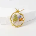 Elegant gold pressed flower resin necklace with real dried floral pendant - August
