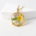 Elegant resin necklace with real yellow dried flower pendant on 18K gold plated chain - December