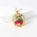 Elegant gold plated resin pendant necklace with real preserved red and white flowers - January