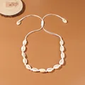 Collana di conchiglie di ciprea fatta a mano con corda intrecciata bianca regolabile per mare. - Collana Singola / Bianco