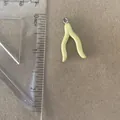 Pale yellow wishbone-shaped charm pendant shown with a ruler for size measurement detail - Wishbone Style Trunk Pendant Only (Without Chain)