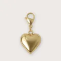 Close-up detail of a polished gold heart-shaped DIY charm with a lobster clasp. - Heart Pendant / Gold