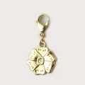 Detailed view of a gold flower DIY pendant featuring a textured five-petal design - Daisy Flower Pendant / Gold