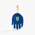 Detailed macro view of a blue Hamsa hand pendant with a teardrop turquoise stone inlay. - Hamsa Hand Pendant / Dark Blue
