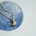 18K gold plated stainless steel necklace featuring a man-in-the-moon crescent pendant - Gold (Moon Shape)
