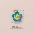 Vibrant blue flower charm with cute green frog face detail, made of stainless steel - Blue Flower Pendant