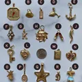 Selection of gold-plated stainless steel pendants featuring anchor, sun, and heart designs - Scale Pendant / Gold