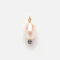 Detailed close-up view of an elegant white oval pearl pendant with a blue gemstone - No. 23 Pearl Rhinestone Pendant