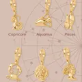 Detail view of various 18k gold-plated stainless steel zodiac charms for DIY jewelry - Capricorn Pendant / Gold