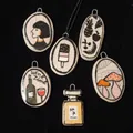 Close-up of dopamine style stainless steel enamel pendants with various artistic motifs. - Portrait Pendant Only (Without Chain)