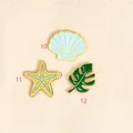 Three-piece enamel brooch set featuring seashell, starfish, and monstera leaf designs - Green Leaf Style(12)