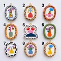 Group of nine hand-painted floral pendants with various animal print frame designs. - Zebra Pattern Purple Flower
