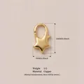 Vista dettagliata della chiusura a moschettone a stella dorata con dimensioni e materiale - Fibbia Stella / Rame (15x9 mm)