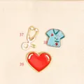 Selection of medical theme enamel pins featuring stethoscope, scrubs, and a red heart - Heart Style(39)