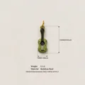 Detailed view of green enamel guitar pendant showing dimensions and stainless steel material - Guitar Shape / 1 Piece / Guitar Pendant