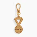 Vintage gold metal medal keychain featuring engraved "HONORS" text and laurel leaves - Honors Medal Charm