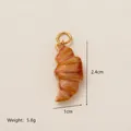 Realistic 3D croissant food charm pendant with precise dimensions and weight info - Croissant Pendant (YKXS26041265GK)