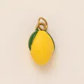 Detailed view of a bright yellow ceramic lemon pendant for DIY jewelry making. - Single Pendant (No Chain) / Green Leaf Lemon