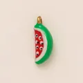 Detailed view of a whimsical ceramic watermelon charm with unique eye patterns for DIY - Watermelon 1