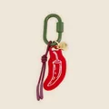 Detailed close-up of a minimalist red chili pendant keychain with green carabiner - Red Chili Pendant