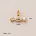 Dainty candy-shaped charm pendant with 'eat me' inscription and white enamel finish - Gold Candy Pendant