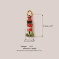 Vue macro détaillée d'un pendentif phare coloré en cuivre avec taille et poids. - Pendentif Phare N° 1