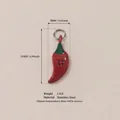 Detailansicht des roten Chilischoten-Anhängers aus Edelstahl mit 24 mm Höhenmessung - Chili-Anhänger