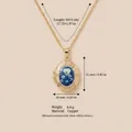 Collana vintage con medaglione ovale dorato con design floreale blu e misure - Stile fiore blu ovale (6)