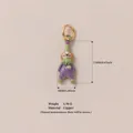 Detailed macro shot of a purple enamel clown pendant with dimensions and weight info. - Pink Figure Pendant