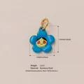 Detaillierter blauer Blumenanhänger mit Smiley und Edelstahl-Materialangaben - Blaue Blumenanhänger