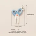 Blue and white enamel scissor shaped pendant charm with a small red heart detail - Scissors Pendant
