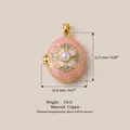 Detailed view of pink enamel floral locket pendant with pearl and size dimensions. - Pink Flower Style