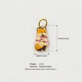 Close-up detail of a 15mm floral patterned fox stainless steel pendant for DIY jewelry making - Fox with Hat Pendant