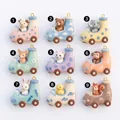 Variety of cute ceramic cartoon animal car pendants with colorful patterns and gold loops - 1 Pig Driving Pendant / 1 Pig Driving Pendant