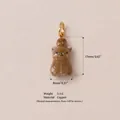 Dettaglio del ciondolo a forma di animale marrone alto 17 mm con info sul materiale rame - 12 Scoiattolo Pinolo