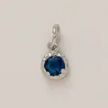 Elegant round silver-plated DIY charm pendant featuring a dark blue faceted gemstone - September Birthstone